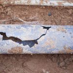 Cracked pipe requiring sewer line repair
